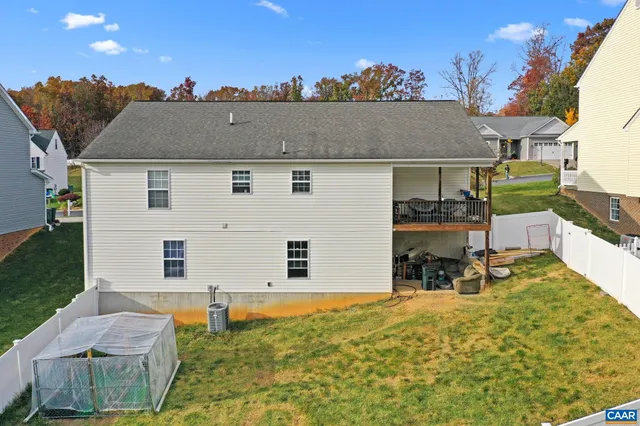 an aerial view of a house with patio outdoor seating and dining space