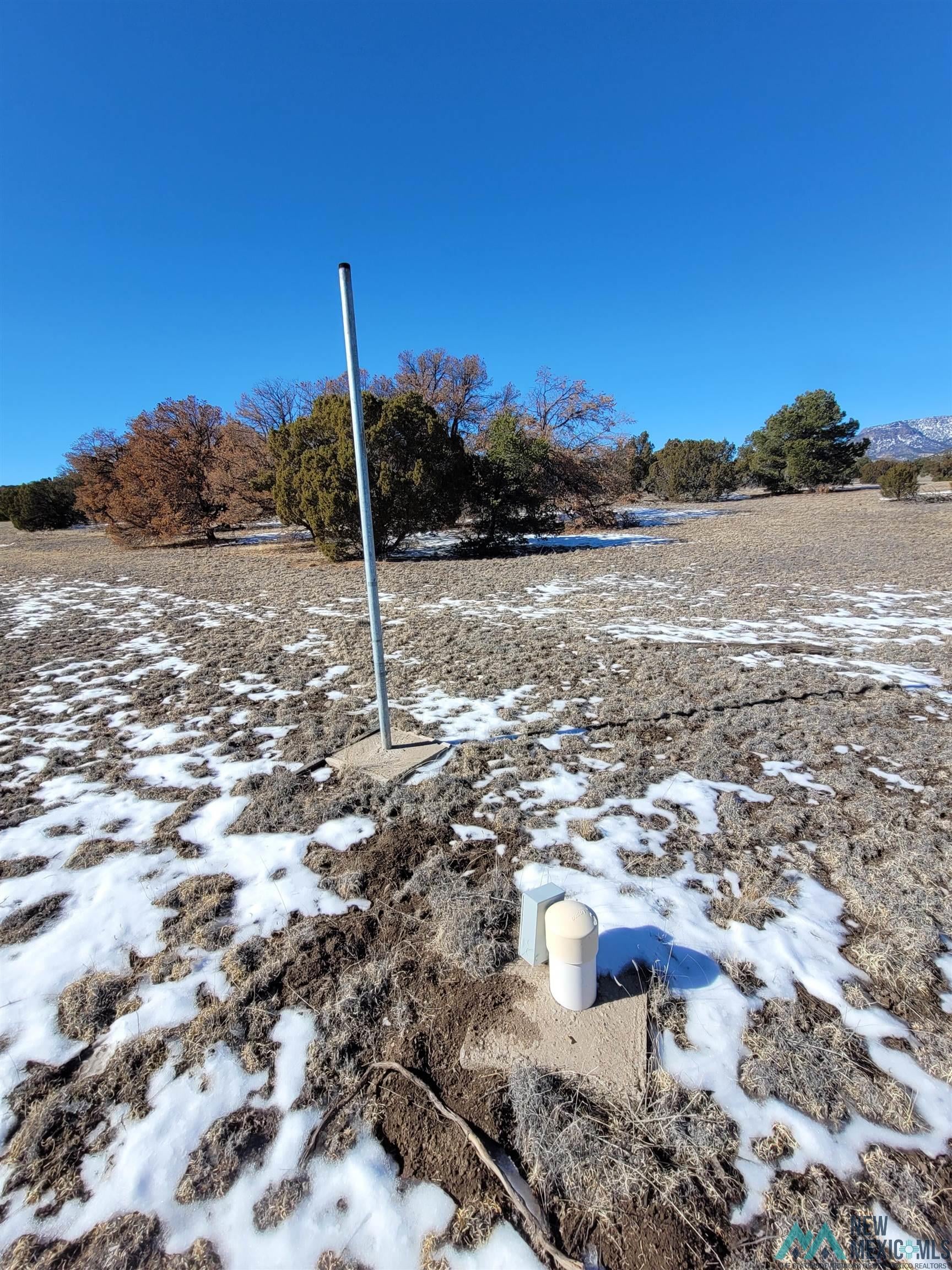 1 Jackass Lane, Unit 1 Datil, NM 87821 - Photo 39 of 46 View of snowy yard