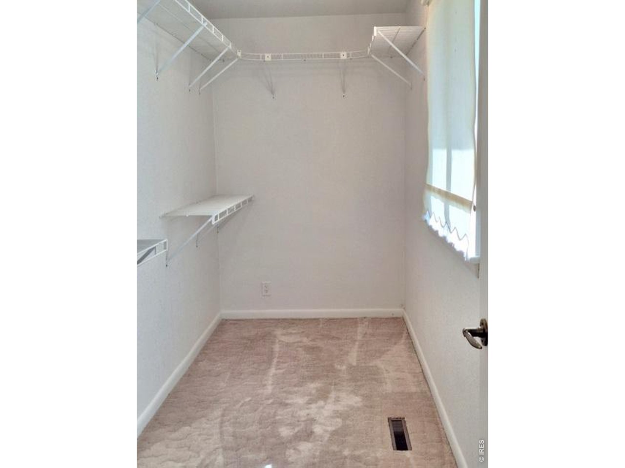 310 Cleveland Street Sterling, CO 80751 - Photo 12 of 25 Primary Bedroom 15x5 ft Walk-In Closet
