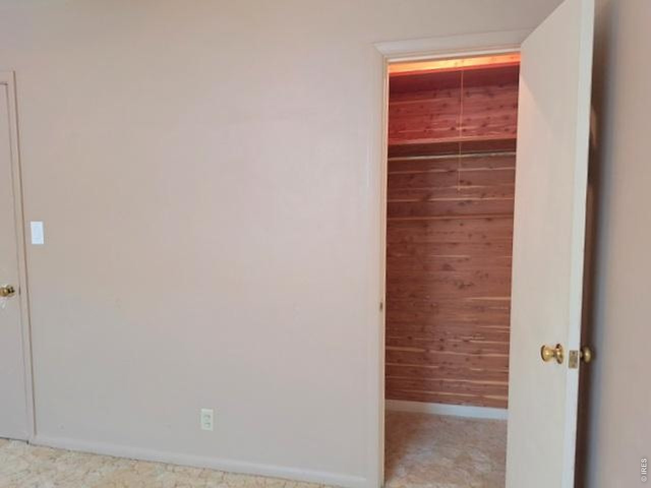 310 Cleveland Street Sterling, CO 80751 - Photo 14 of 25 Primary Bedroom Cedar Closet