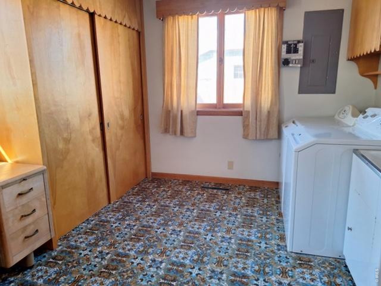 310 Cleveland Street Sterling, CO 80751 - Photo 21 of 25 Laundry with Desk Area and Closet and Utility Sink