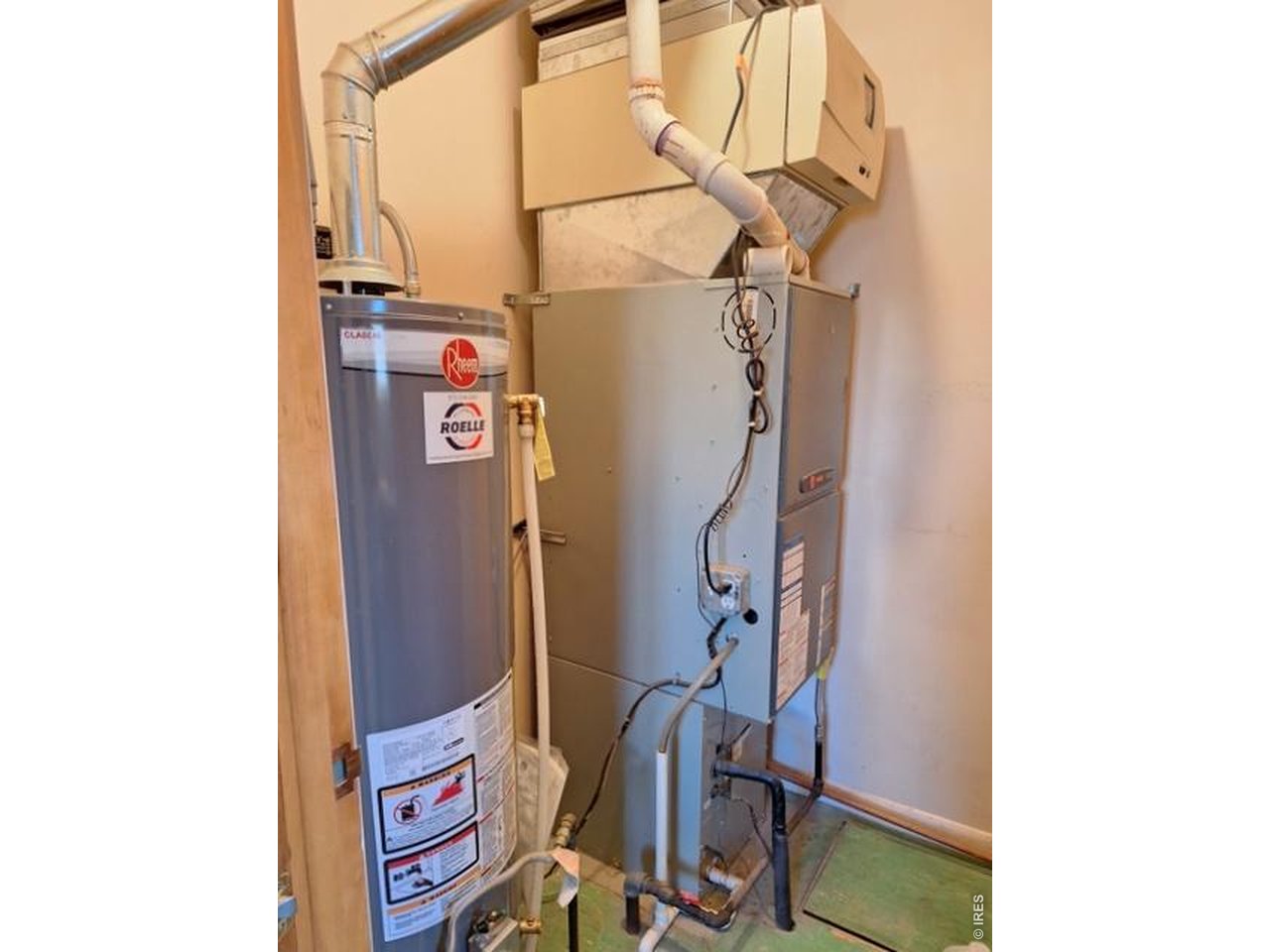 310 Cleveland Street Sterling, CO 80751 - Photo 23 of 25 Furnace and Hot Water Heater Plus Crawl Space Entrance