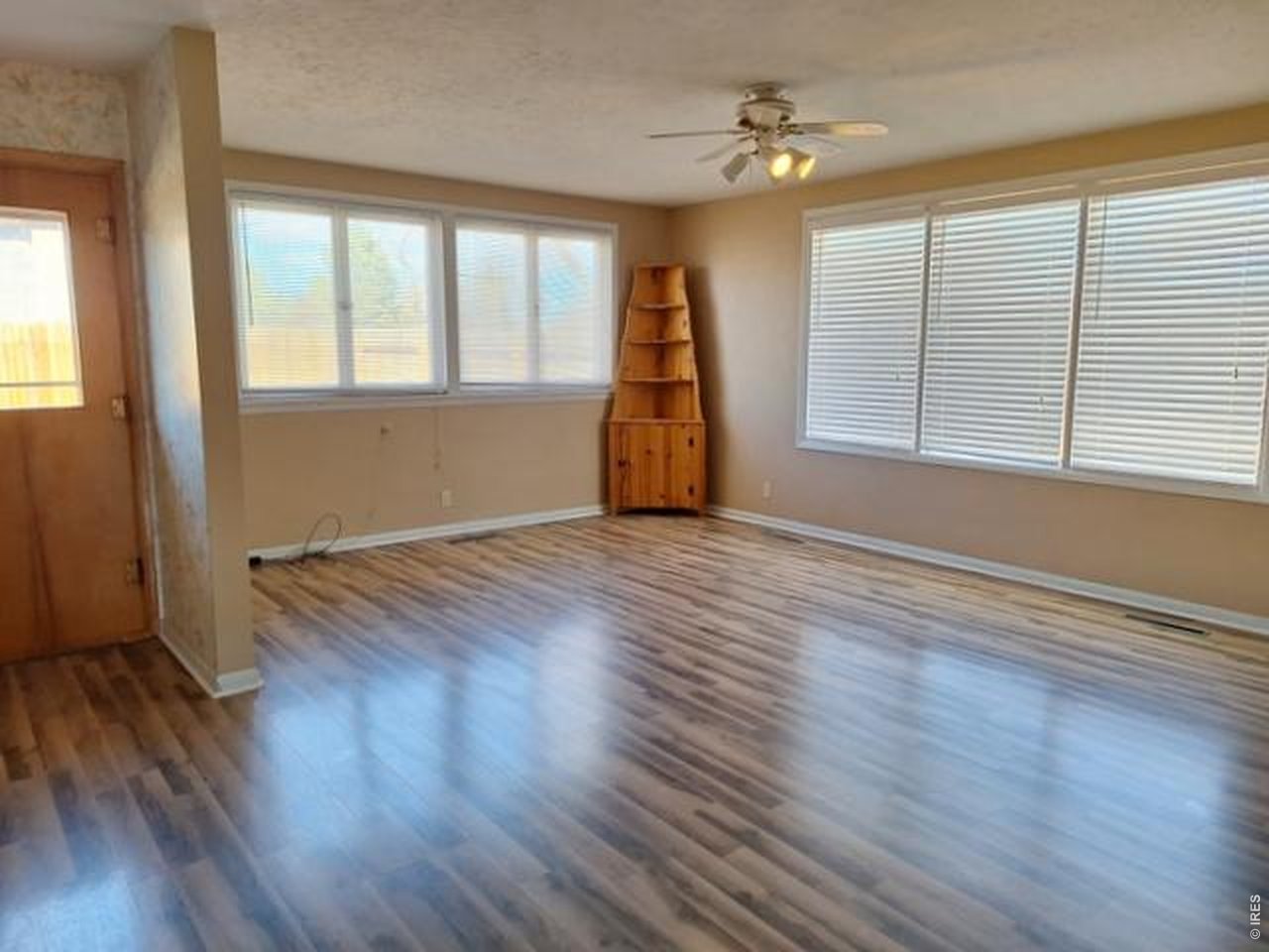 310 Cleveland Street Sterling, CO 80751 - Photo 10 of 25 Spacious Family Room and/or Dining Room