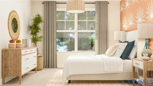 a bedroom with a bed mirror and window