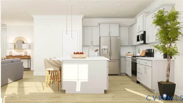 a kitchen with a sink appliances and cabinets