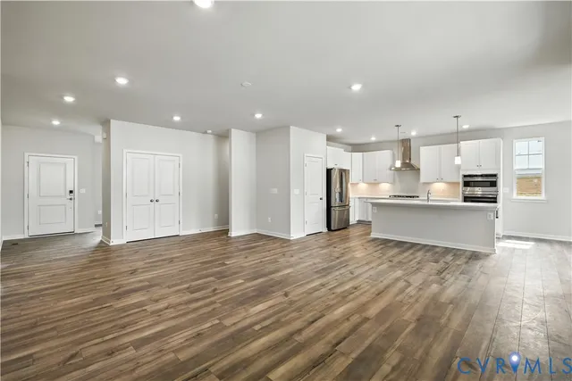 a view of kitchen with wooden floor