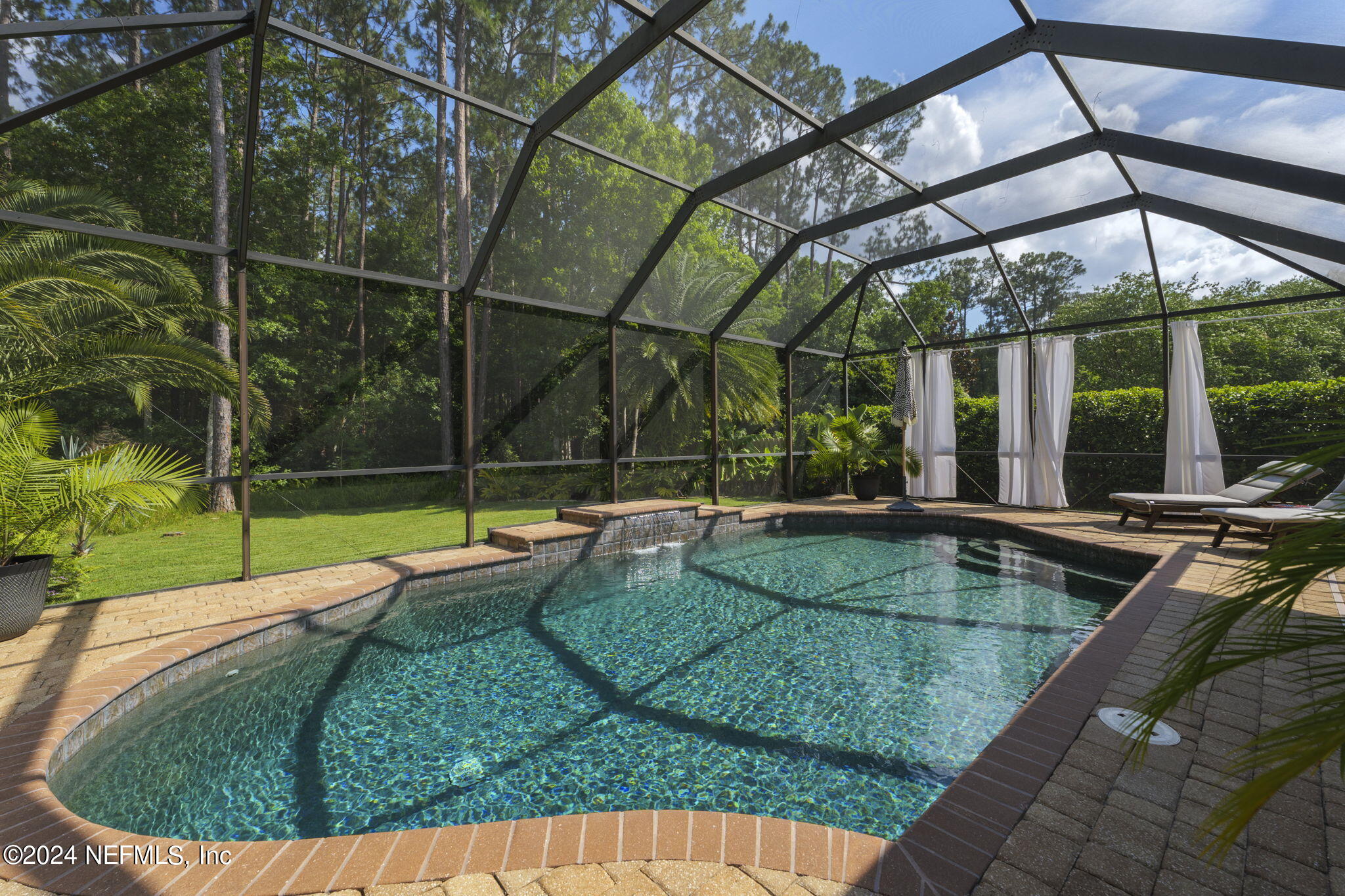 1273 Ribbon Road St. Johns, FL 32259 - Photo 14 of 50 a view of a house with a swimming pool