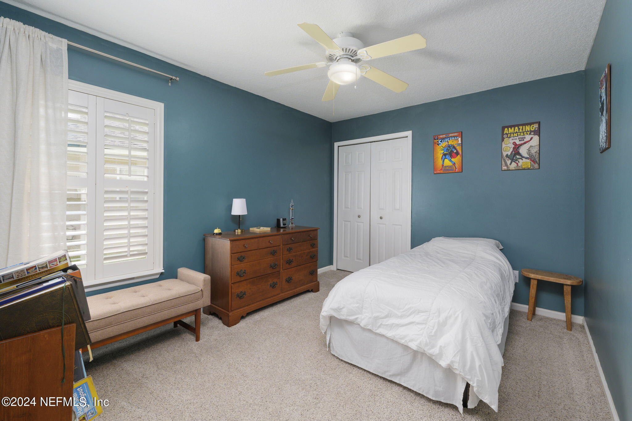 1273 Ribbon Road St. Johns, FL 32259 - Photo 42 of 50 a bedroom with a bed and a window