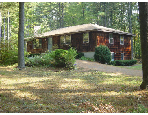 4 Still River Road Sterling, MA 01564 - Photo 1 of 6 a view of a house with backyard and sitting area