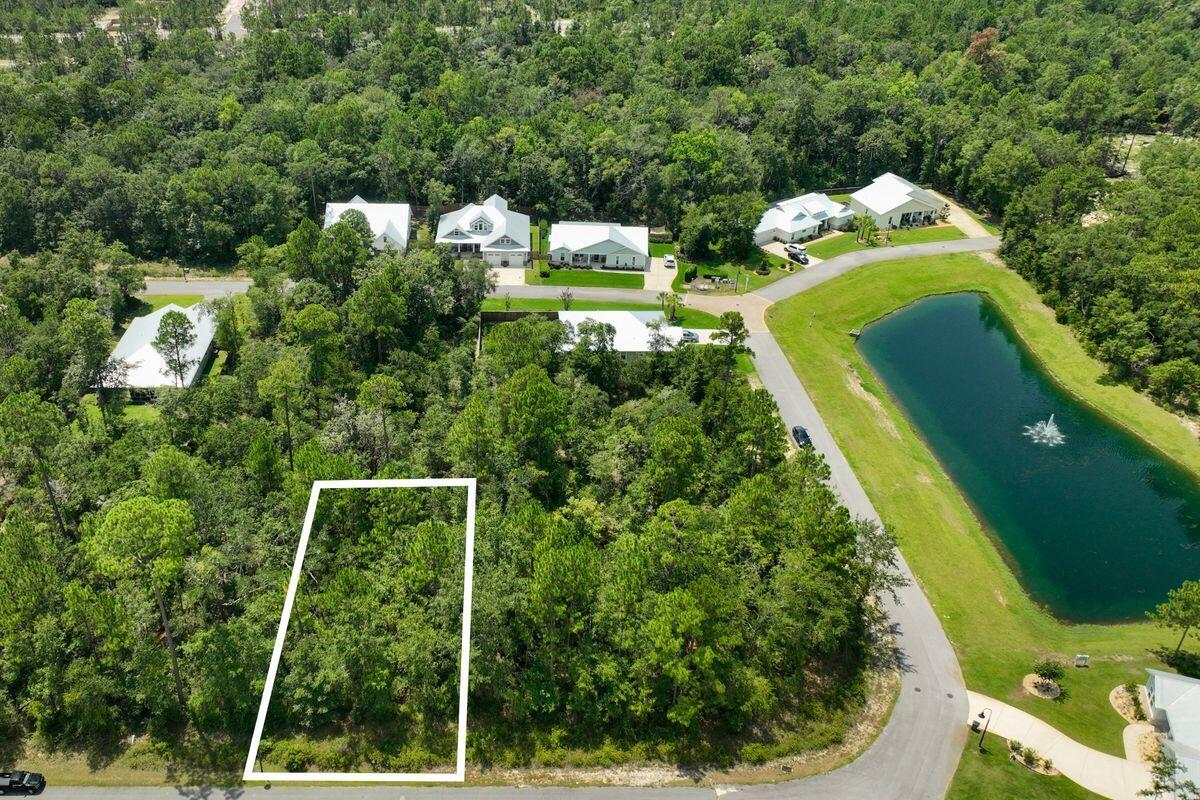 Lot 52 Muzzle Street Freeport, FL 32439 - Photo 2 of 13 a view of a garden