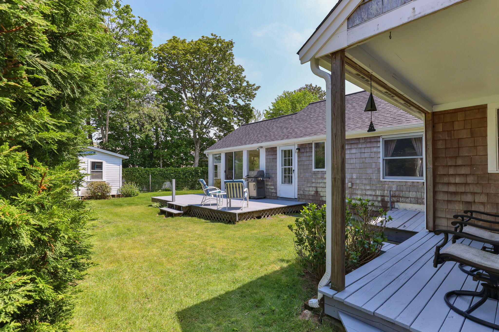 7 Aunt Matties Road Chatham, MA 02633 - Photo 33 of 37 a view of a house with backyard patio and swimming pool
