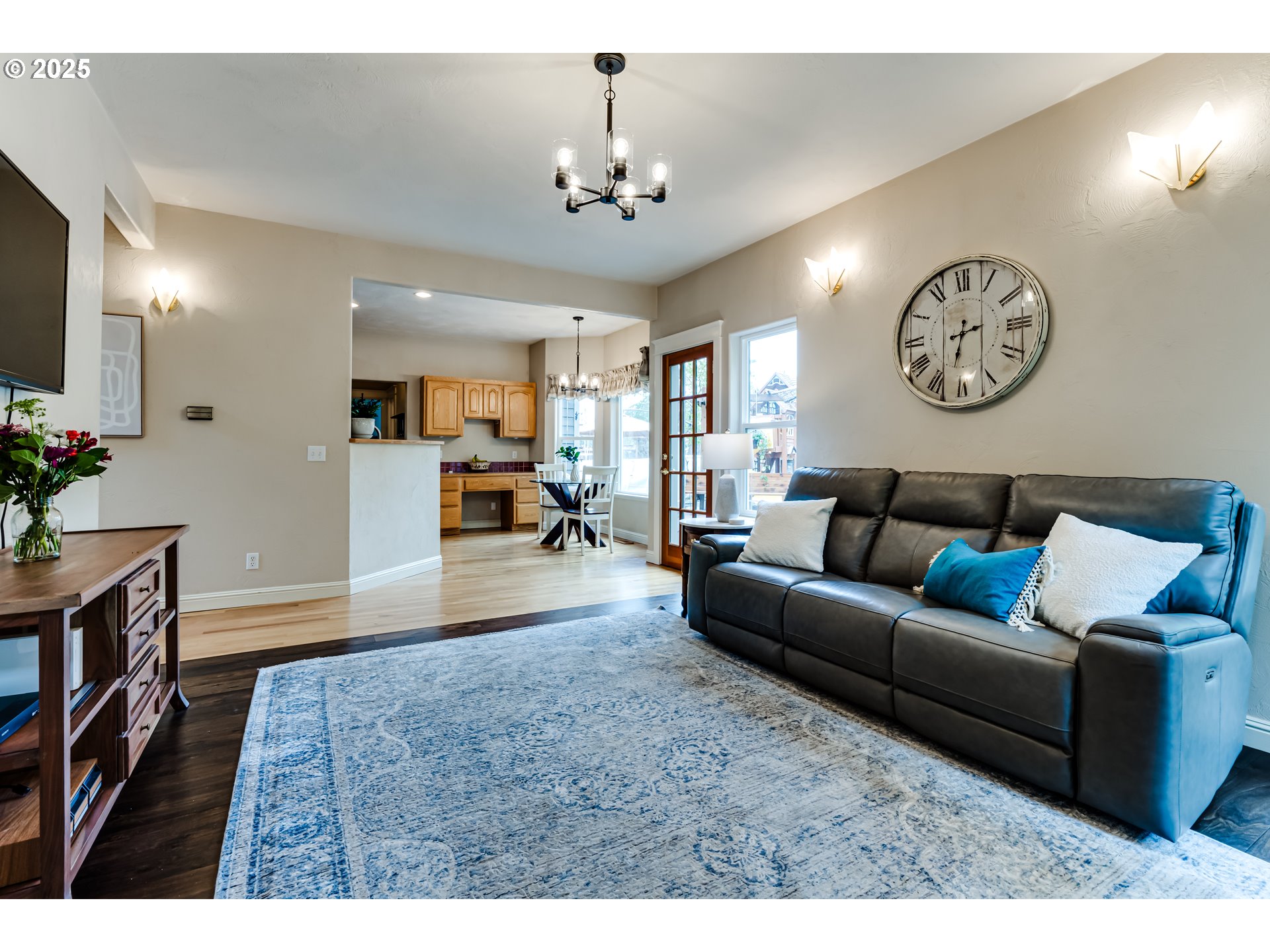 1187 South 69th Street Springfield, OR 97478 - Photo 13 of 42 a living room with furniture and a chandelier
