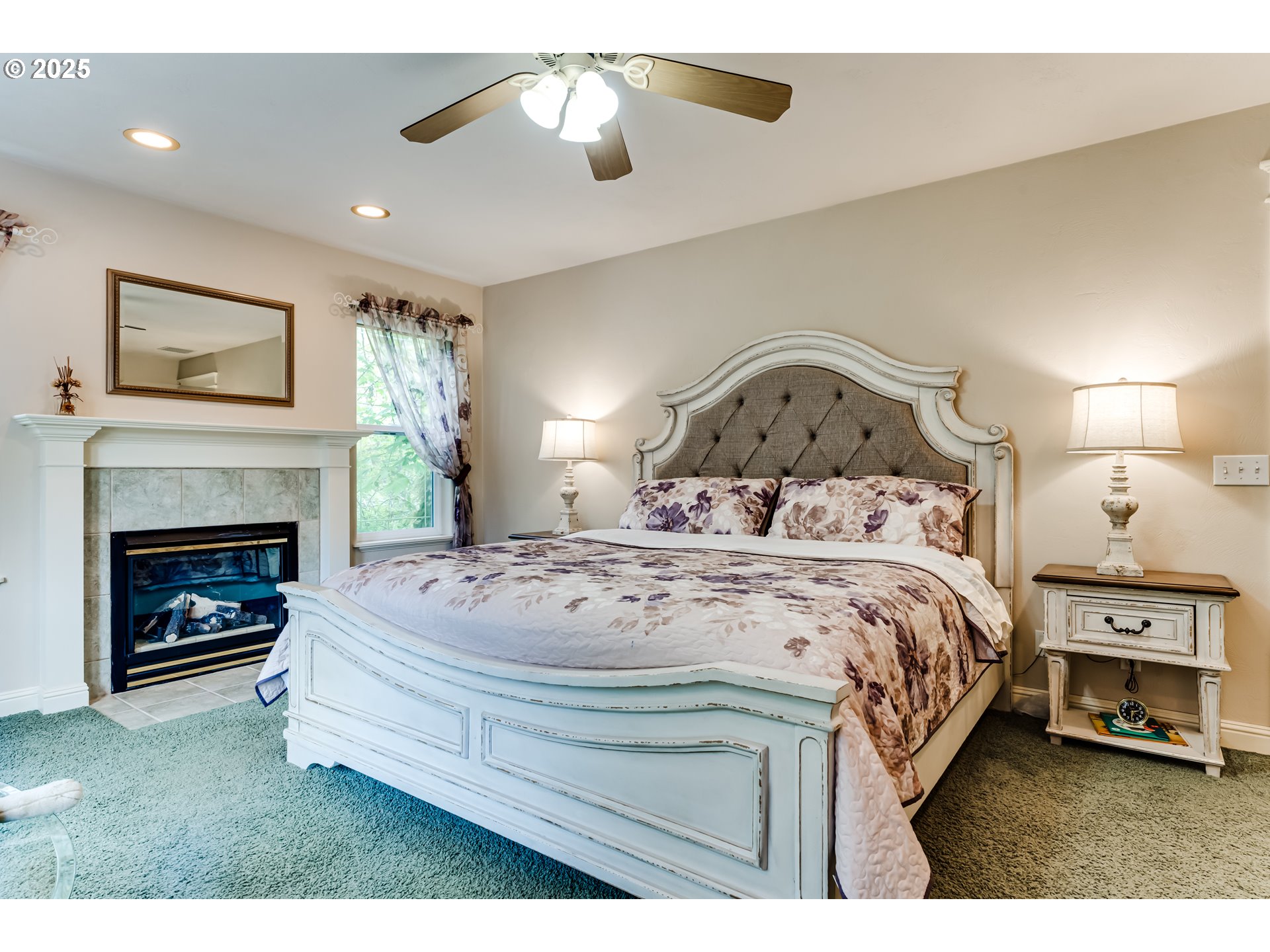 1187 South 69th Street Springfield, OR 97478 - Photo 24 of 42 a bedroom with a bed and a fireplace