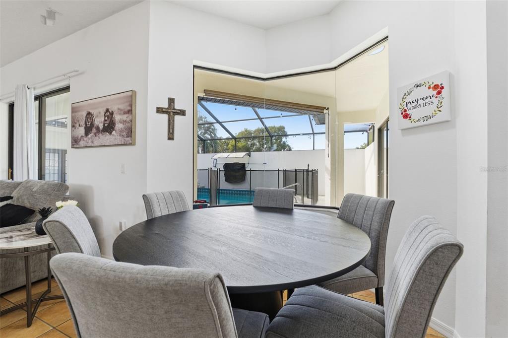 8451 Delta Court Weeki Wachee, FL 34613 - Photo 22 of 64 a living room with furniture and a large window