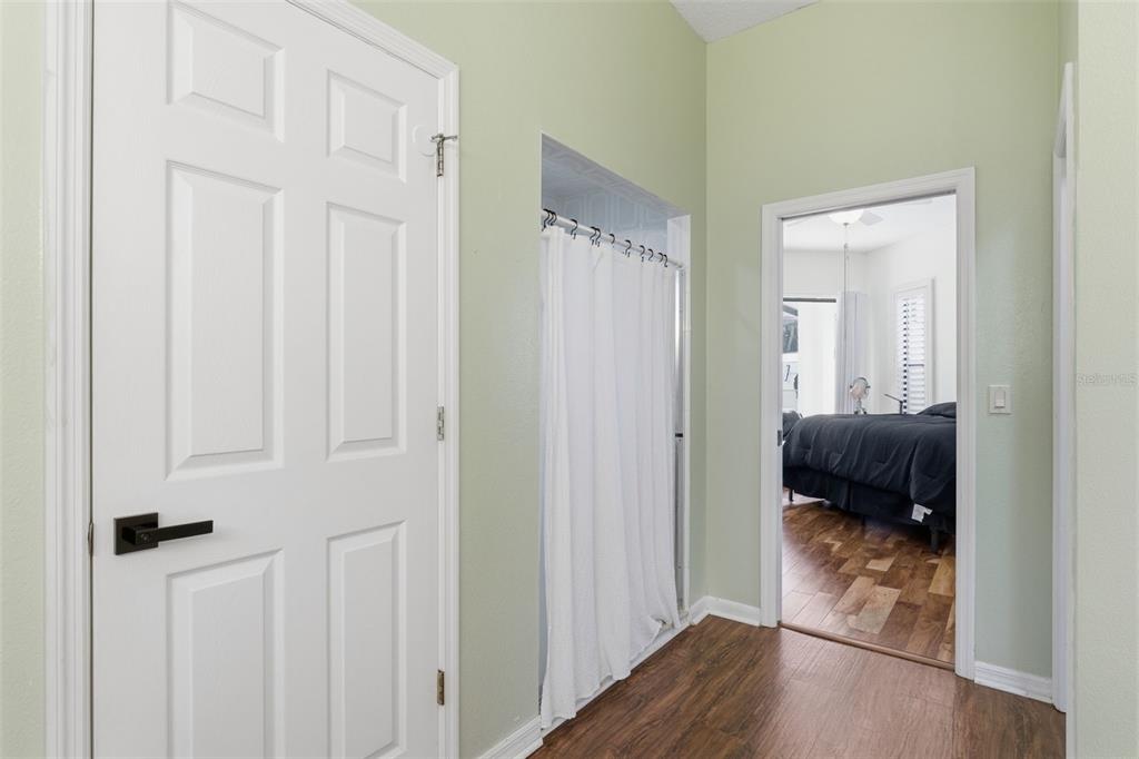 8451 Delta Court Weeki Wachee, FL 34613 - Photo 36 of 64 a view of a bedroom from a hallway