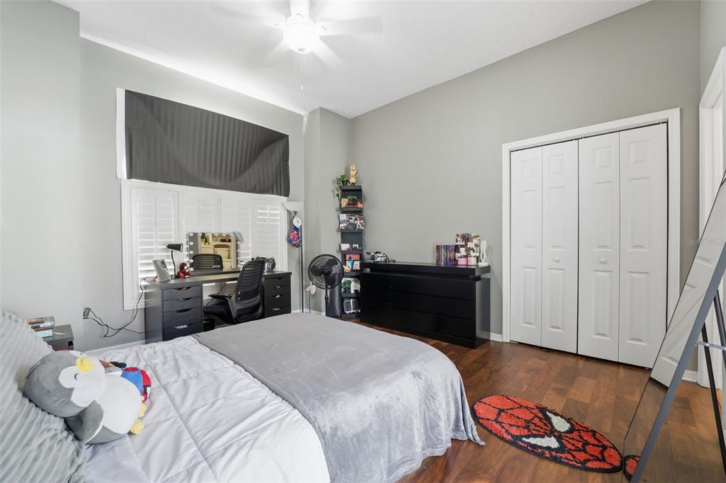 8451 Delta Court Weeki Wachee, FL 34613 - Photo 43 of 64 a bedroom with a bed and a dresser in it