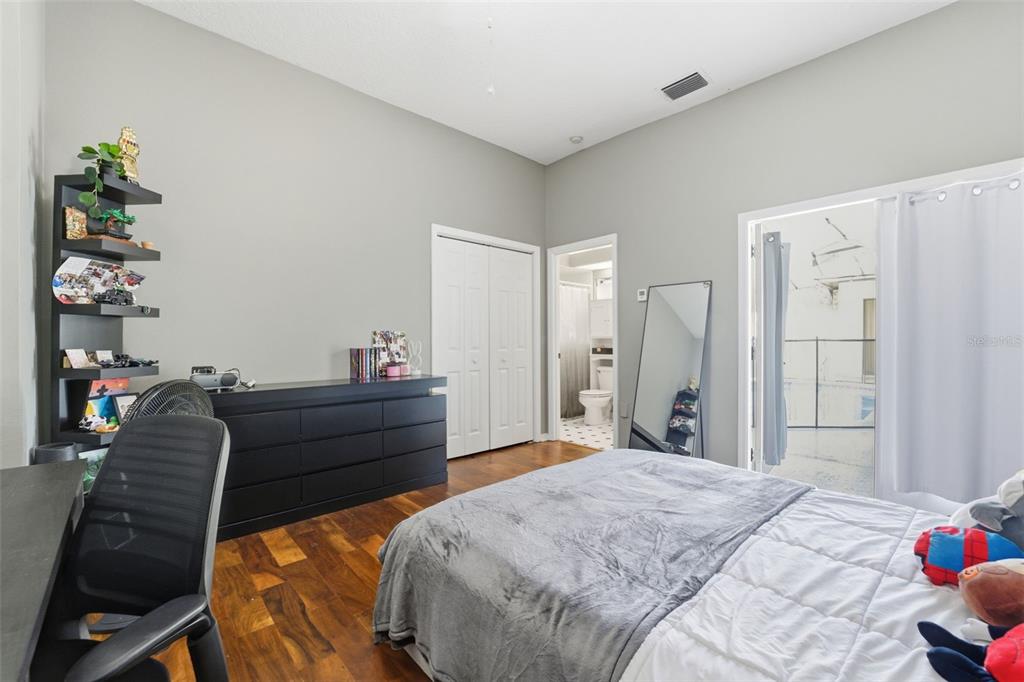 8451 Delta Court Weeki Wachee, FL 34613 - Photo 44 of 64 a bed room with a bed and a dresser