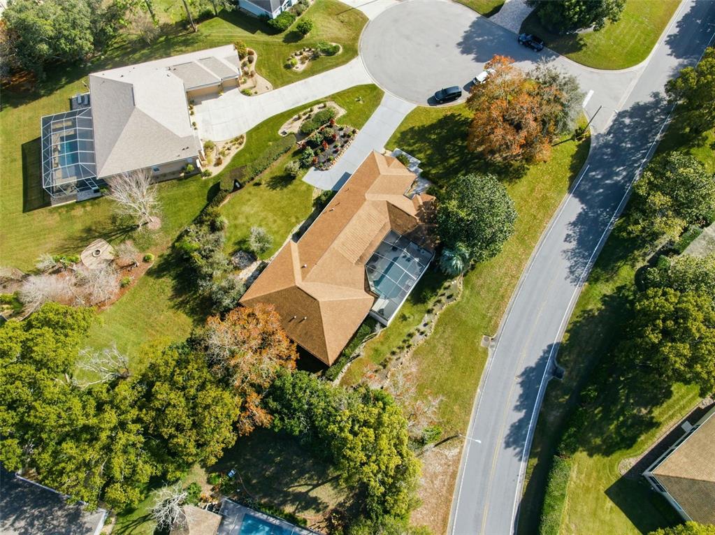 8451 Delta Court Weeki Wachee, FL 34613 - Photo 57 of 64 an aerial view of a house with a yard and garden