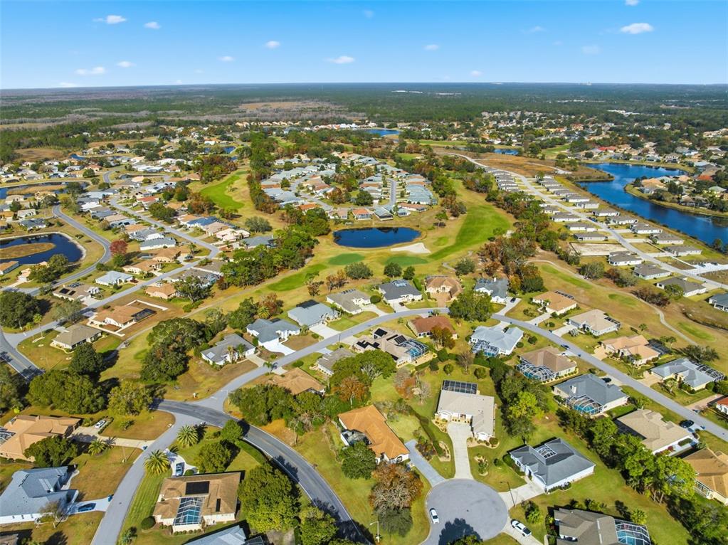 8451 Delta Court Weeki Wachee, FL 34613 - Photo 60 of 64 an aerial view of residential building with parking space