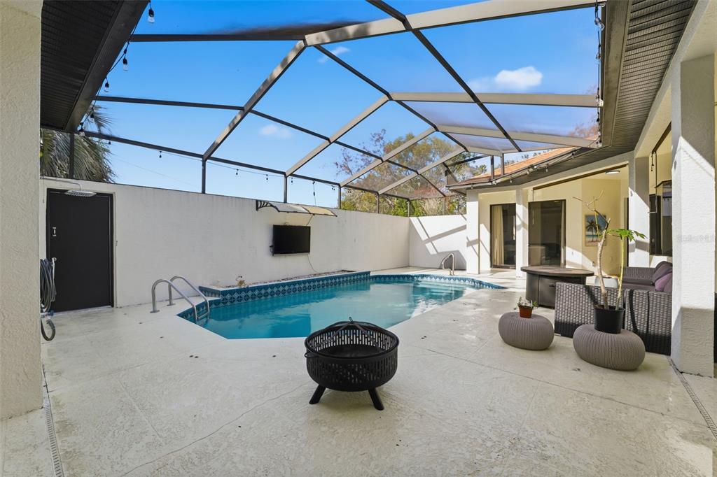 8451 Delta Court Weeki Wachee, FL 34613 - Photo 6 of 64 a living room with furniture and a flat screen tv