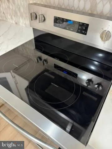 a bathroom with a bathtub and a sink