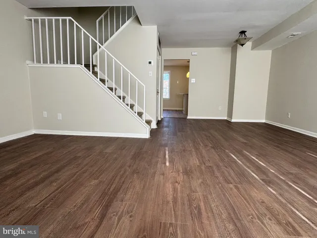 a view of entryway with wooden floor