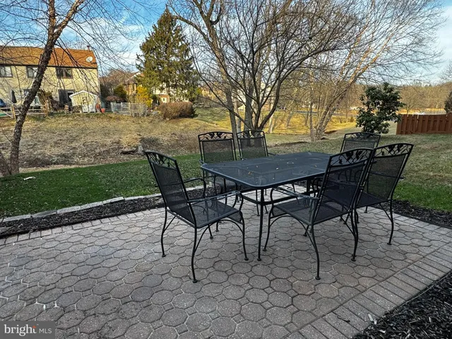 a view of room with racks and wooden floor