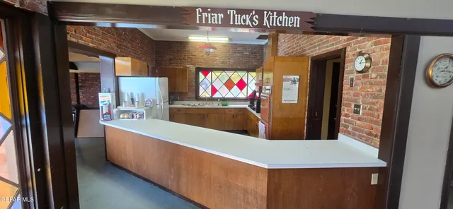 a view of a living room with a tv