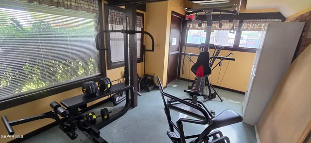 a view of a room with gym equipment