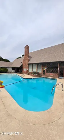 a view of a house with a big yard