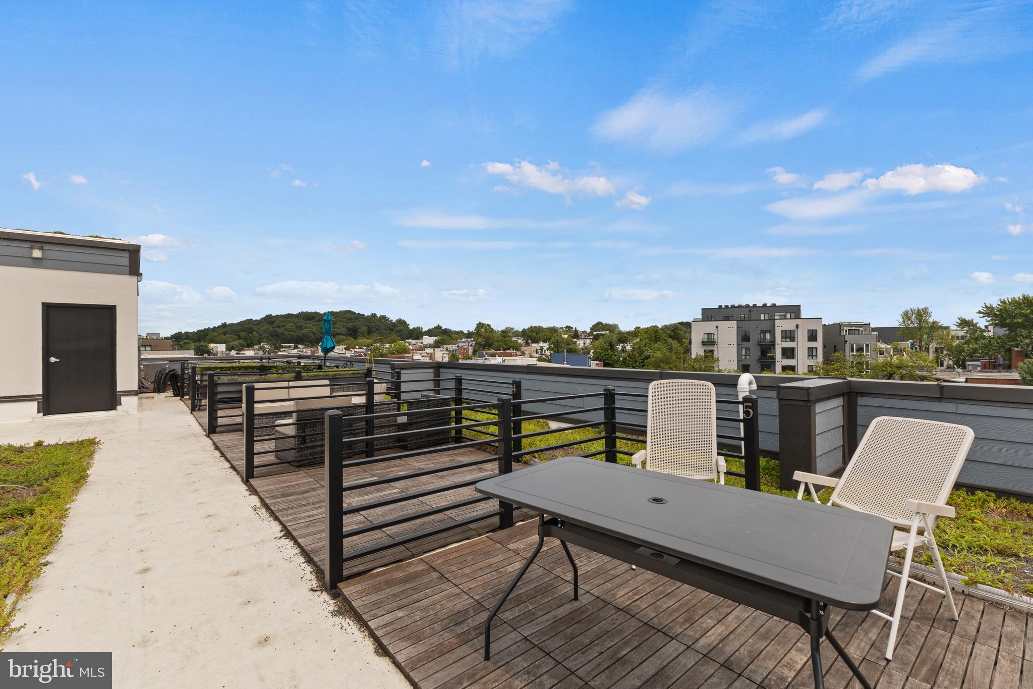 1028 Bladensburg Road Northeast, Unit 37 Washington, DC 20002 - Photo 23 of 29 a view of a terrace with furniture