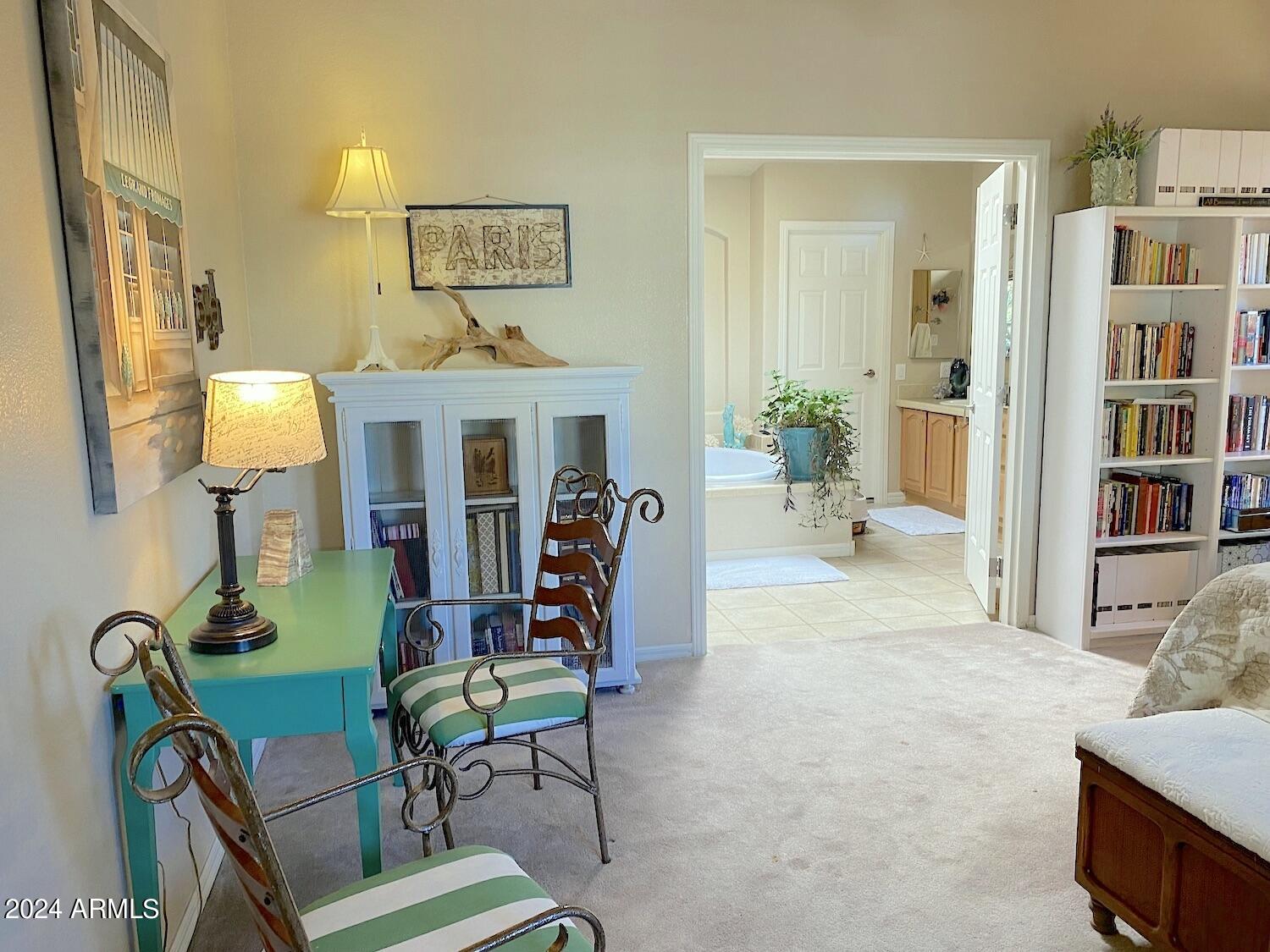 181 Timber Ridge Loop Show Low, AZ 85901 - Photo 28 of 57 a view of a livingroom with furniture and a book shelf