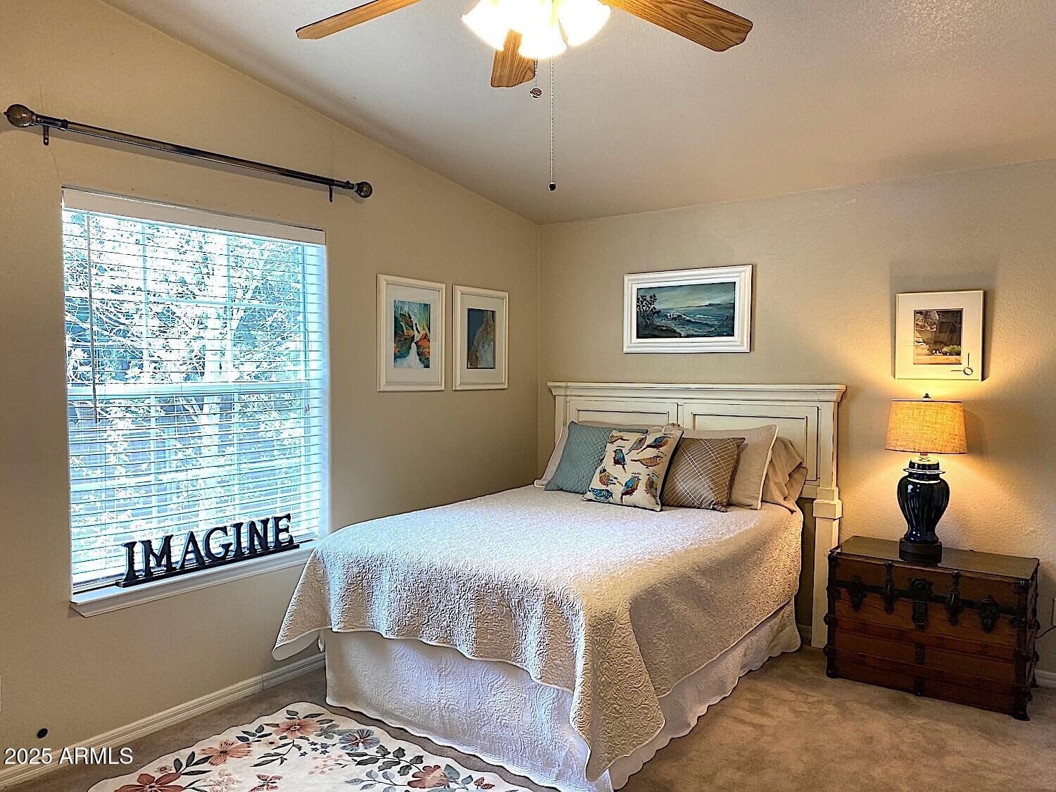 181 Timber Ridge Loop Show Low, AZ 85901 - Photo 33 of 57 a bedroom with a bed dresser and a window