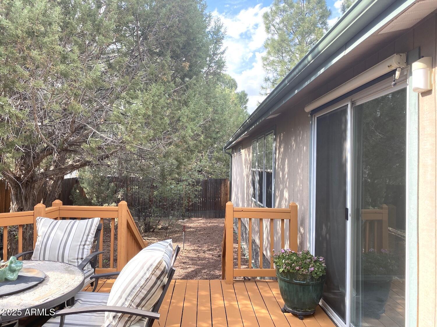 181 Timber Ridge Loop Show Low, AZ 85901 - Photo 44 of 57 Dual pane sliding glass doors to deck