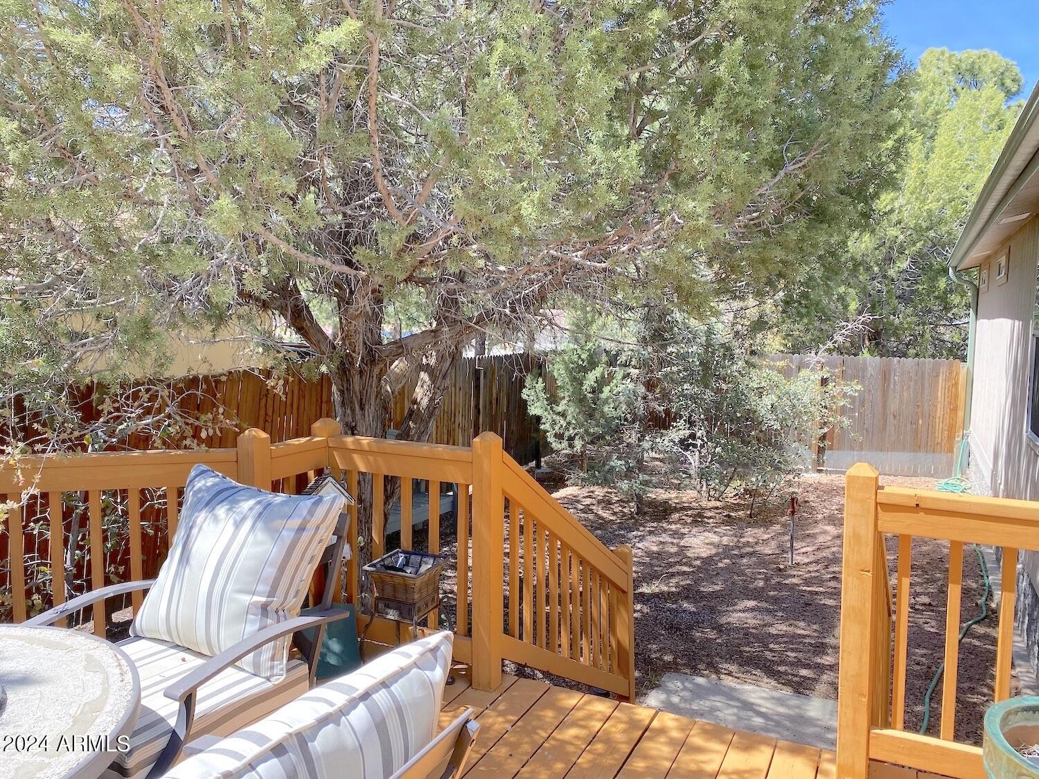 181 Timber Ridge Loop Show Low, AZ 85901 - Photo 46 of 57 Mature trees and fenced yard