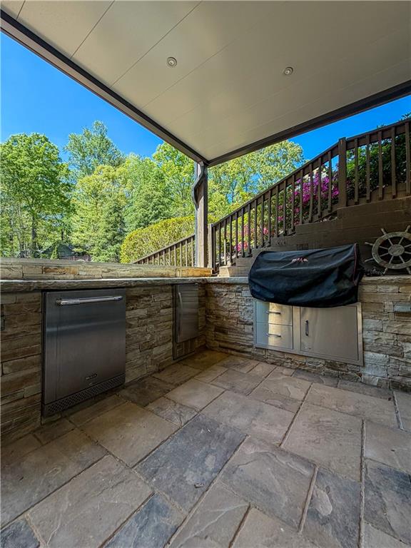 310 Flatstone Way Marietta, GA 30064 - Photo 11 of 44 a view of a porch with wooden floor