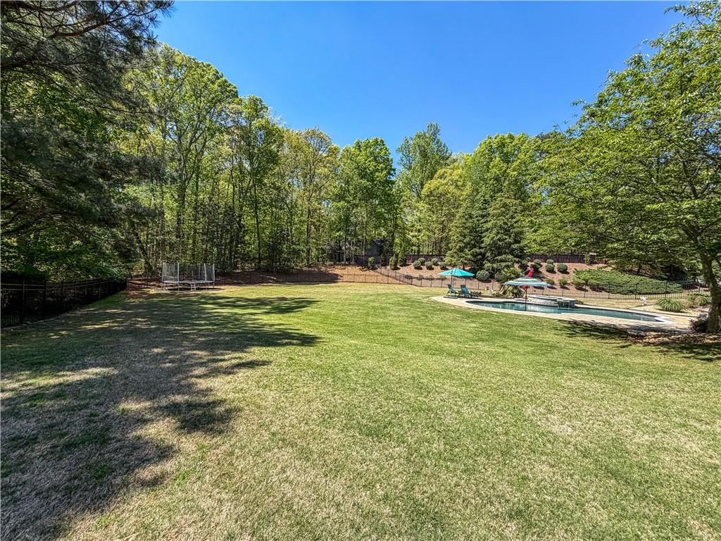 310 Flatstone Way Marietta, GA 30064 - Photo 14 of 44 a view of a house with a big yard