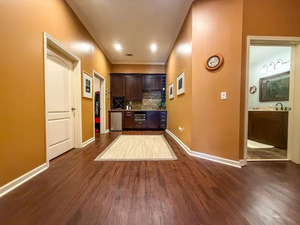 a view of a livingroom with wooden floor