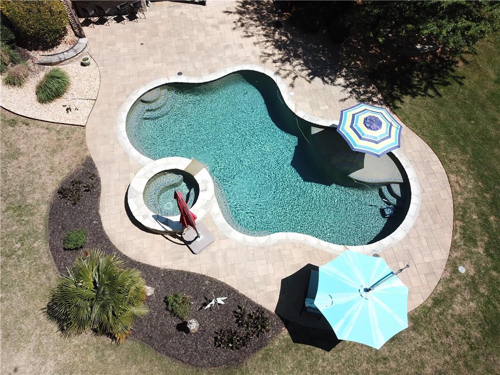 310 Flatstone Way Marietta, GA 30064 - Photo 2 of 44 an aerial view of a house with a swimming pool and outdoor seating