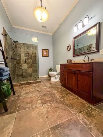 a room with furniture and flat screen tv