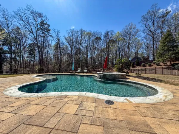 a view of outdoor space yard and swimming pool
