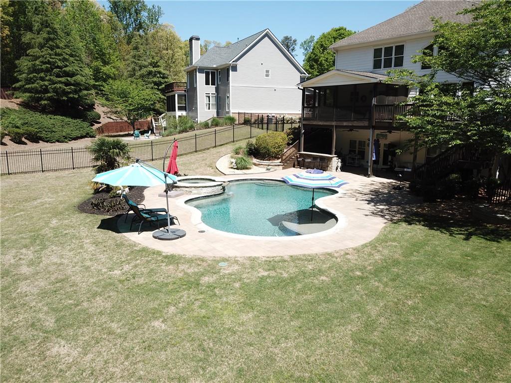 310 Flatstone Way Marietta, GA 30064 - Photo 40 of 44 a front view of house with sitting space and garden