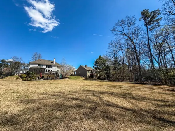 a view of a town with large trees