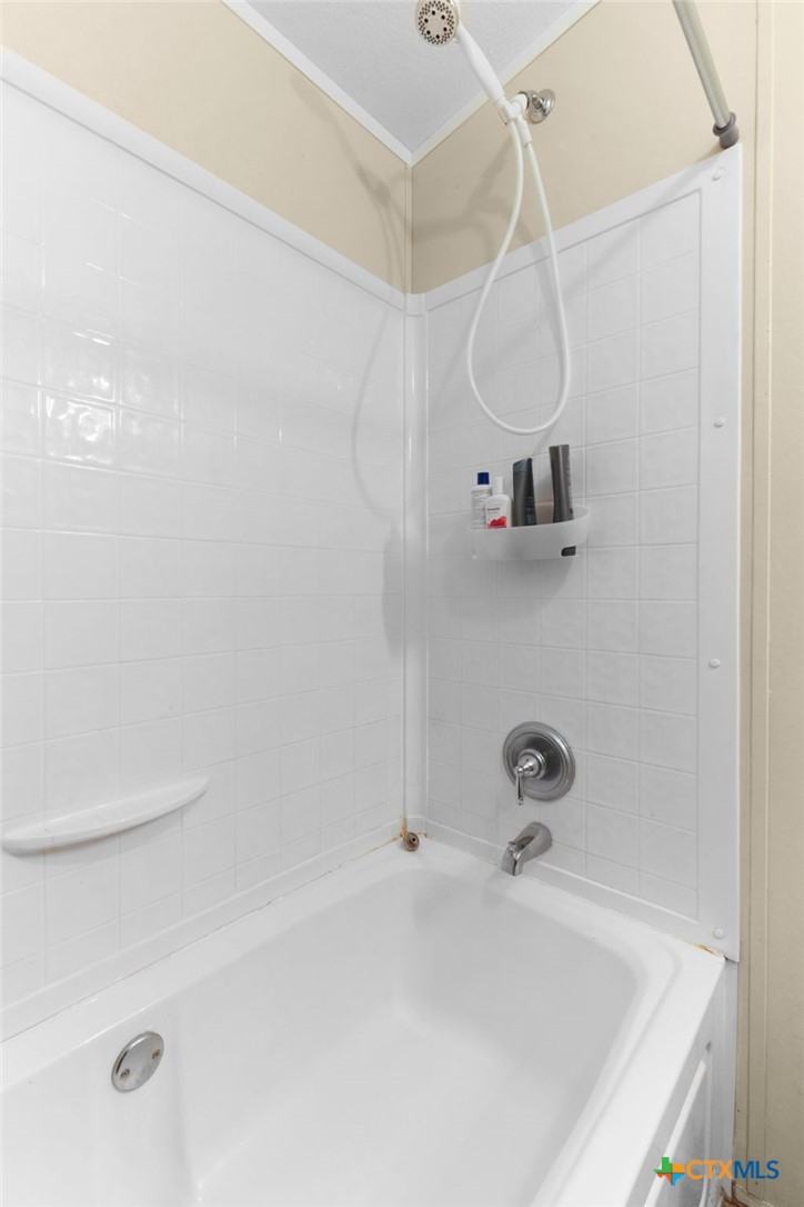 411 Private Road 3447 Kempner, TX 76539 - Photo 20 of 33 a bathroom with a sink and a shower