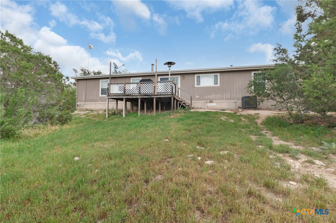 411 Private Road 3447 Kempner, TX 76539 - Photo 25 of 33 a view of a house with a backyard