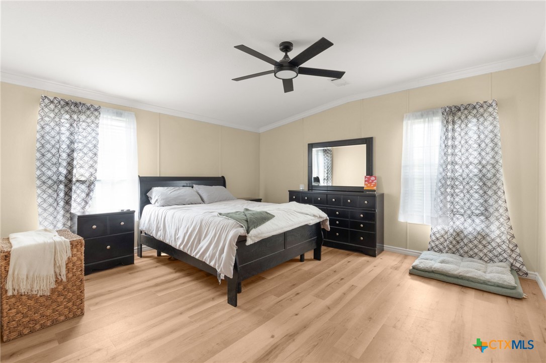 411 Private Road 3447 Kempner, TX 76539 - Photo 4 of 33 a bedroom with a bed and window