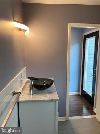 a room that has a window and wooden floor