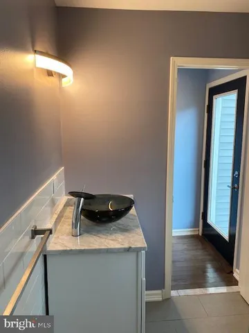 a room that has a window and wooden floor