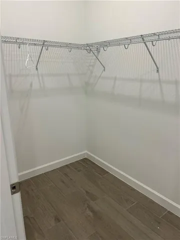 a view of a room with racks on the wall