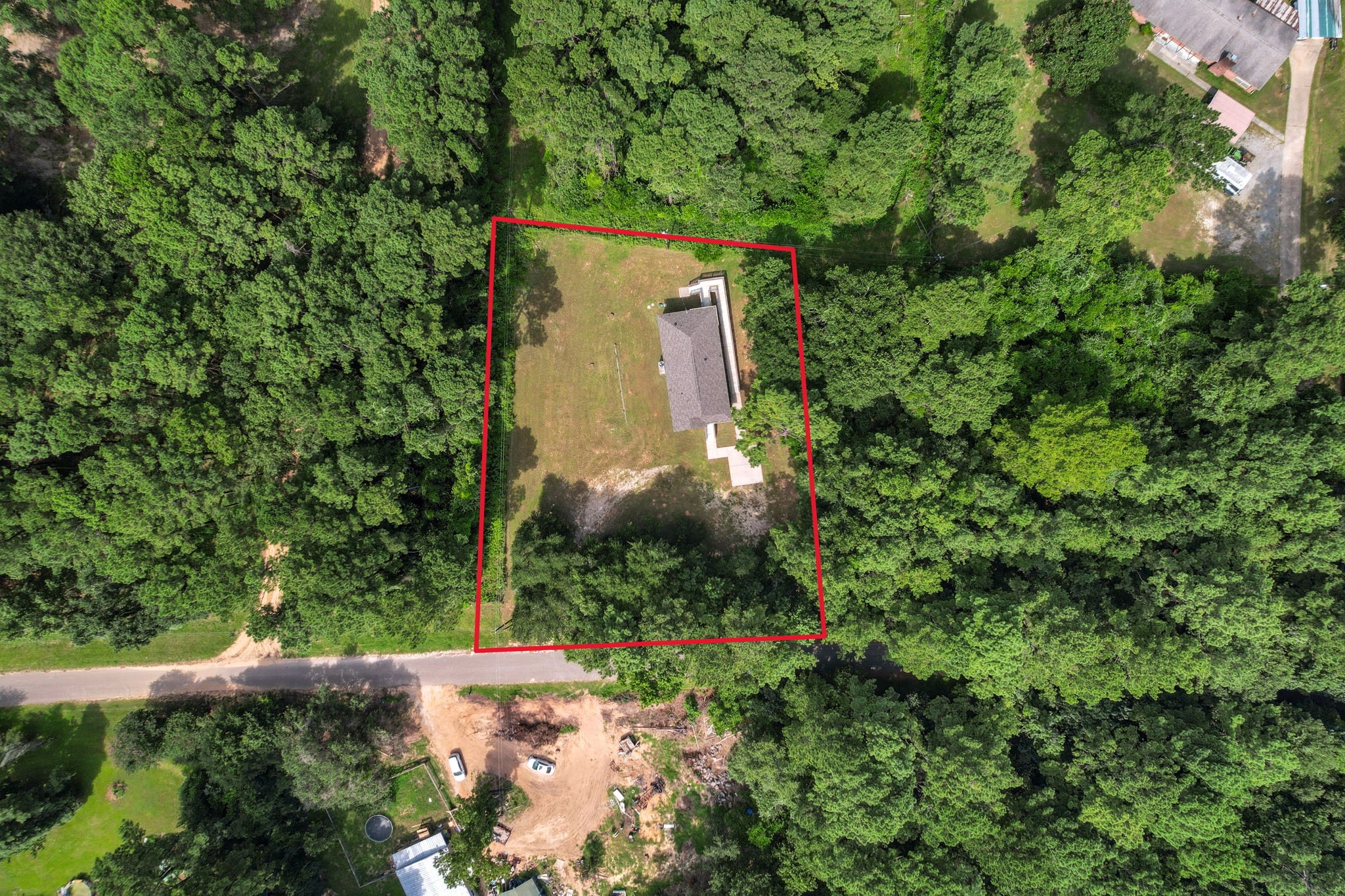 325 Cemetery Road Coldspring, TX 77331 - Photo 2 of 31 an aerial view of a house